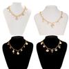 Stylish Gold Crosses Necklace for Women with Seashells Charm Decoration for Beach and Summer Fashion Statement Pieces