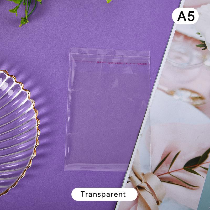 50 ks/balení průhledných samolepicích sáčků s hvězdami, ochranné úložné sáčky s fotokartami a obaly na karty K-pop Idol