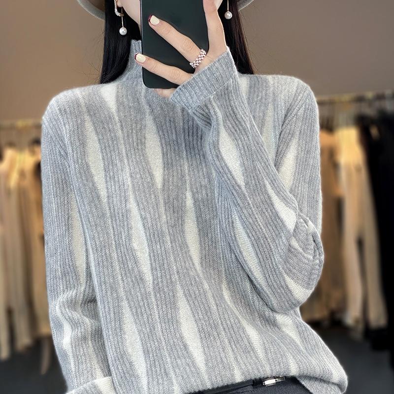 Design sense semi-turtleneck knitted sweater women's autumn and winter new high-end loose and thin bottoming shirt top