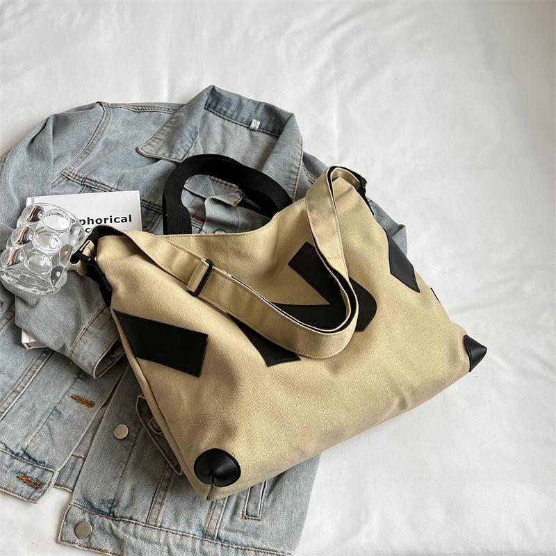 Canvas bag women's new fashionable large-capacity class commuter messenger tote bag student casual tote bag