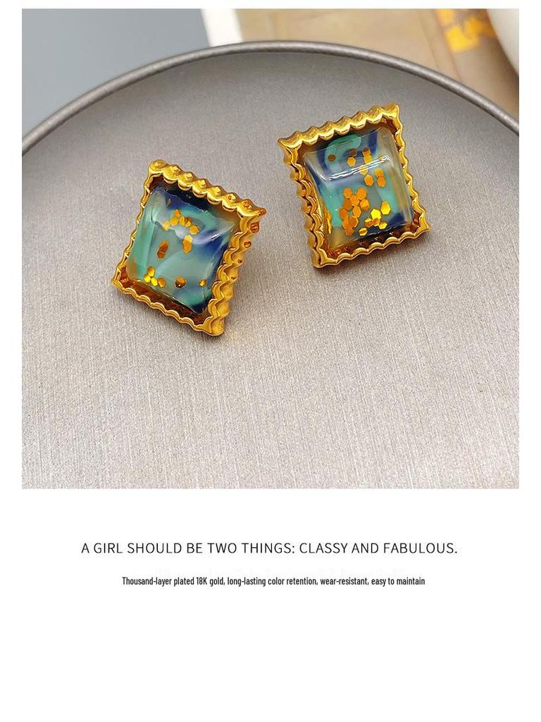 Qingdao Iridescent Geometric Wave Resin Stud Earrings: High-End Retro Fashion for Women