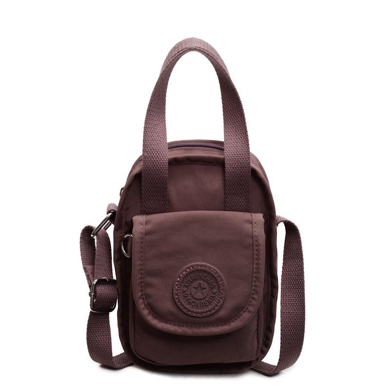 A Stylish Water-resistant and Simple Crossbody Women's Bag for Casual Commuting