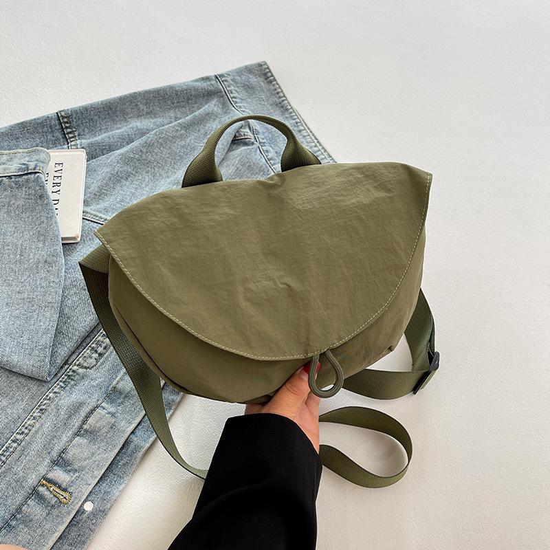 Crossbody bag new men's and women's sports crossbody bag flip cycling small backpack fashionable solid color breast bag