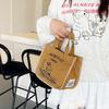 Stylish and cute canvas bag Bento bag New go out small portable lightweight tote bag Daily walking hand bag