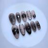 24 Stuks Zwarte Lange Kunstnagels met Amandelkop Design Kattenoog Zilveren Streep Patroon Press-on Nepnagels Draagbare Nageltips