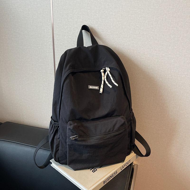 Simple and fashionable large-capacity backpack 2025 new leisure niche college class schoolbag women's solid color backpack