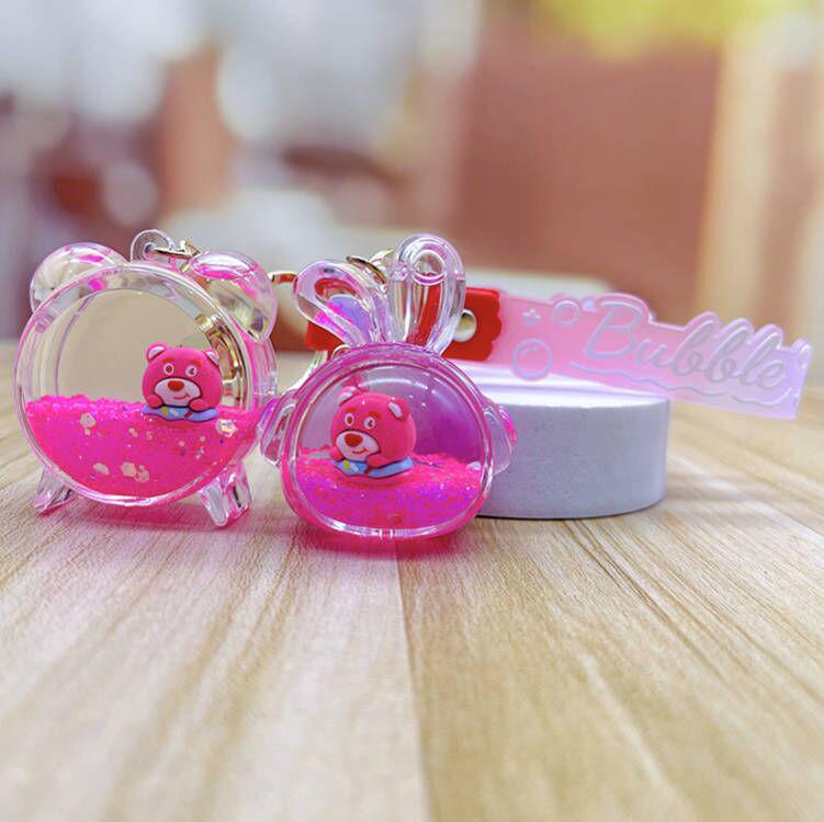 Strawberry Bear Doll Keychain with Colorful Oil-Filled Bottle and Milk Tea Cup Pendant
