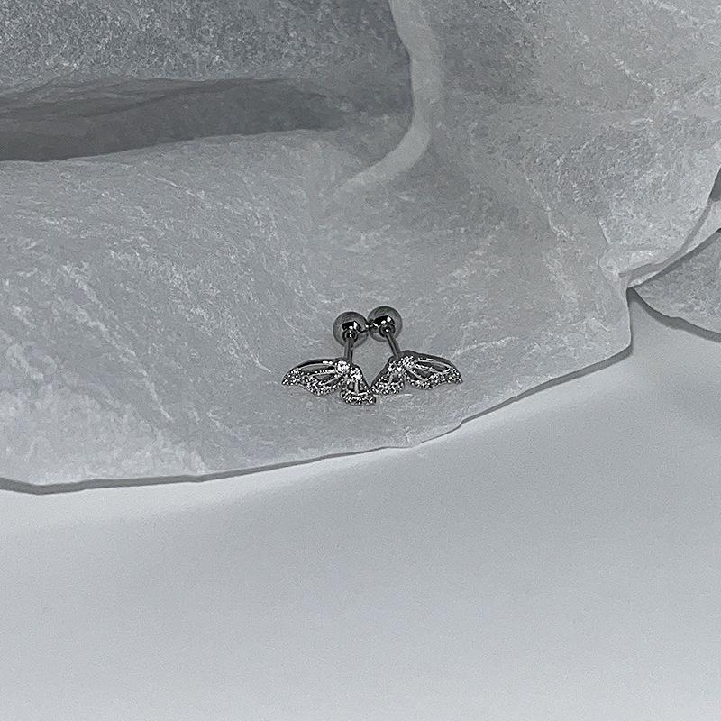 

Асимметричные двойные серьги-каффы с полукрыльями бабочки в форме бриллиантов