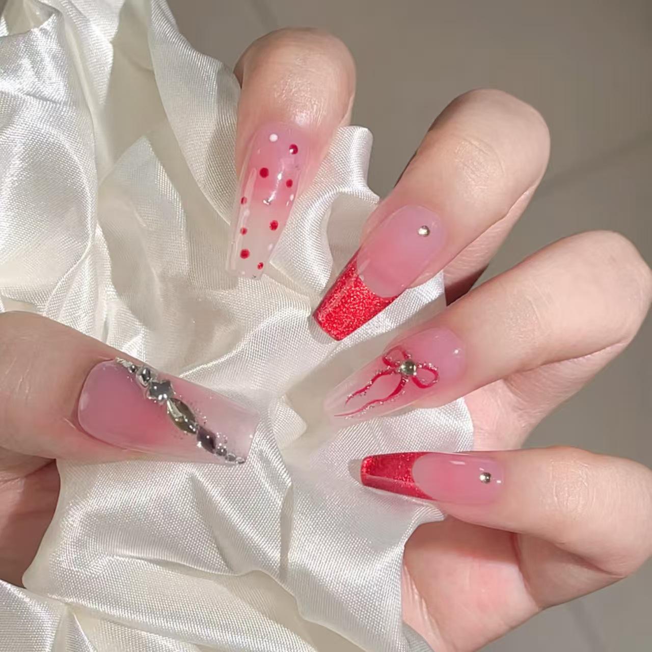 Elegant Red Cat Eye Rhinestone Nails with French Glitter and Polka Dot Bow Medium