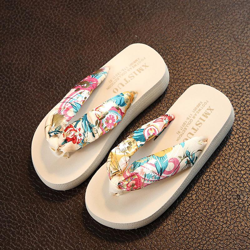 Korean version of summer's new bohemian satin wedge heel non-slip wedge heel pinch flip-flops beach women's cool slippers