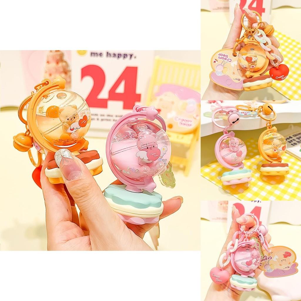 Playful Cartoon Cream Bear Globe Acrylic Keychain Perfect For Unique Key Accessories