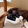 Thick-soled big-headed board shoes increase the height of small autumn and winter new velvet bread shoes muffin casual dad shoes women
