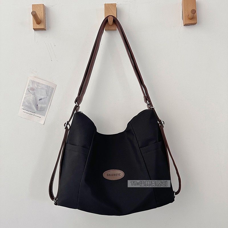 

Three-Purpose Bag Women Canvas Bag Lightweight Fashion Backpack Large Capacity Commuter Tote Bag Student Messenger Bag Black without pendant