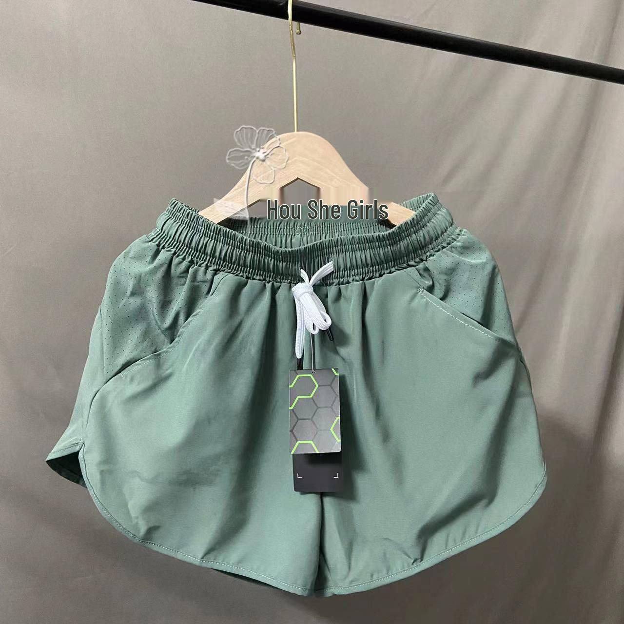 

Женские быстросохнущие двухслойные шорты для йоги и бега Large зелёный