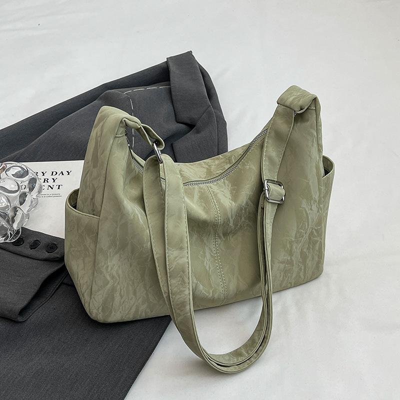 

Большая вместительная сумка женская 2024 новая высококачественная текстура нишевая летняя универсальная сумка-мессенджер на одно плечо женская сумка-пельмень