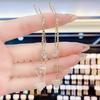 Cat's Eye Tassel Ear Chain 2024 Trend: Elegant Long Earrings with Light Luxury Design