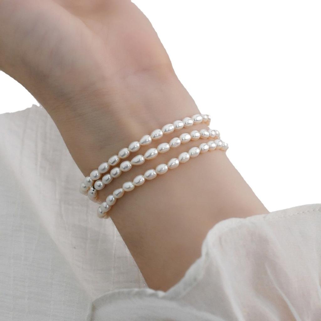 Korean version of transfer beads, natural freshwater pearl bracelet, millet bead elastic bracelet, girlfriend jewelry style bracelet.