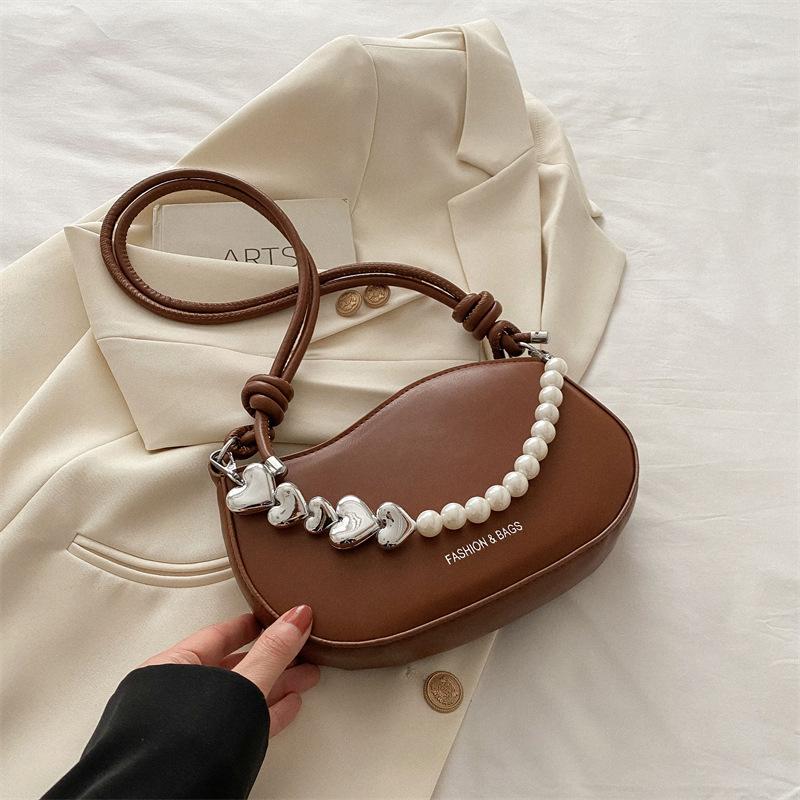 

Gentle fashion texture Gentle texture Small bag women s 2025 spring new versatile ins knotted shoulder strap women s bag коричневый
