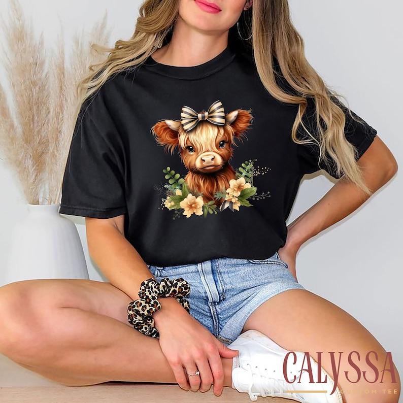 Highland Cow With Bowflowers Tshirt Cute Cow Tee Ecofriendly Shirt Gift Tshirt For Unisexchildren Floral Cow Tee