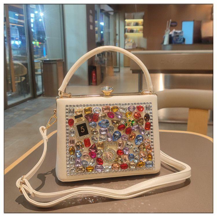 Light Luxury New Leather Fashionable Rhinestone Retro Clip Niche Handbag