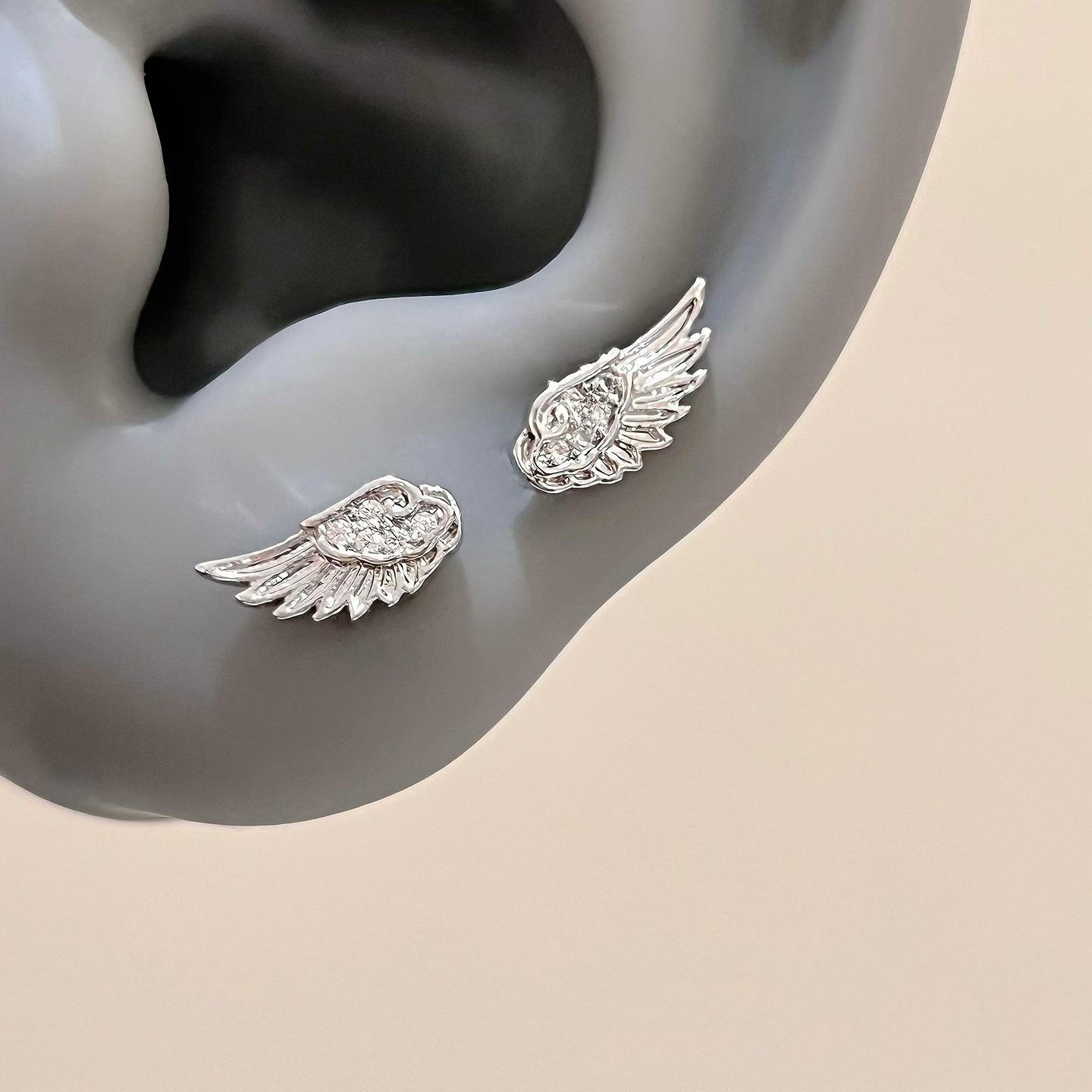 

A Pair Creative Angel Wings Earrings Stud for Women Luxury Zircon Shiny Crystal Cross Copper Color Earrings Fashion Zircon Gift
