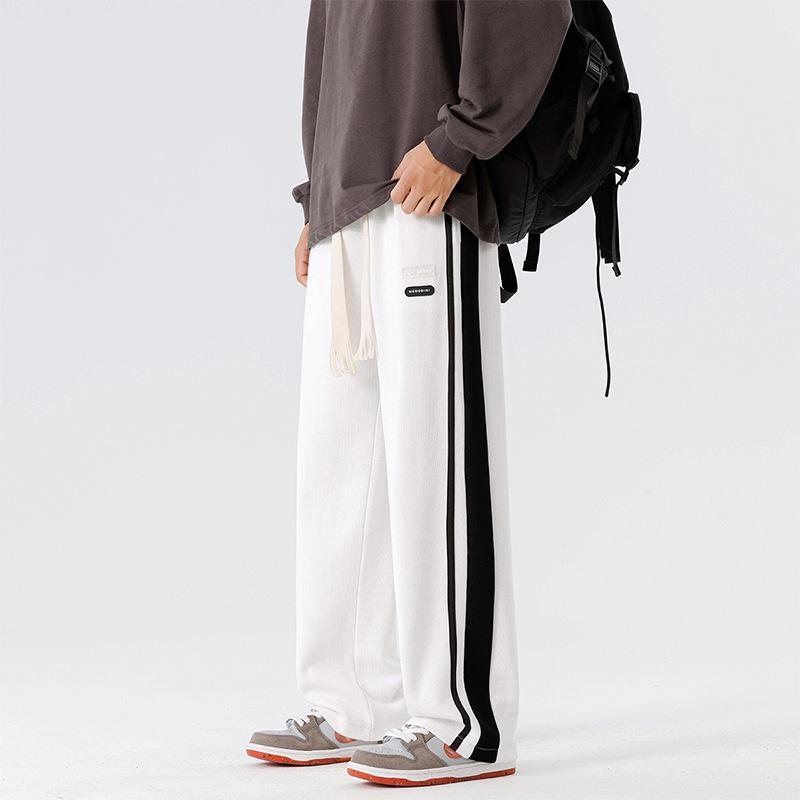 

Весенне-осенние новые мужские повседневные спортивные брюки, трендовые прямые спортивные штаны в стиле хай-стрит, универсальные брюки с широкими штанинами 4XL