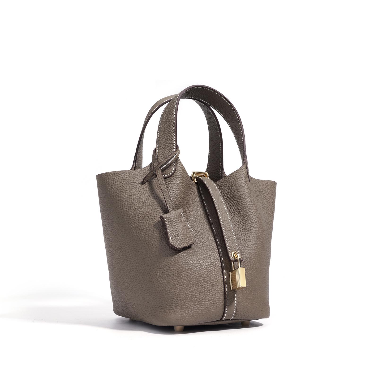 

Женская сумка-ведро из натуральной коровьей кожи - Высококачественная текстура, вместительная сумка с нишевым дизайном