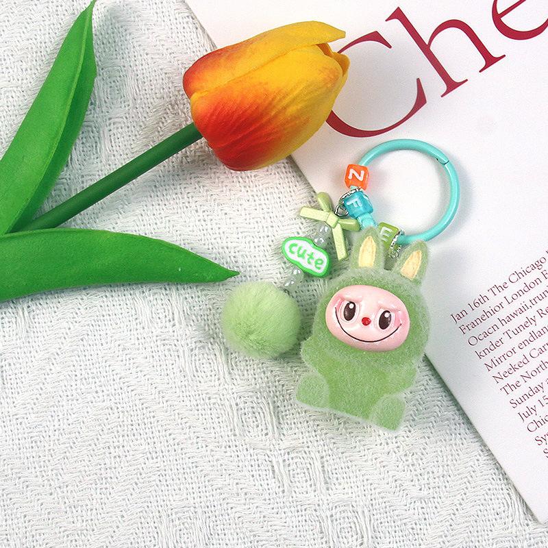 Luminous Flocking Sitting Cloth Doll Cute Grain Pendant Creative Cartoon Keychain Mobile Phone Chain Bag Pendant