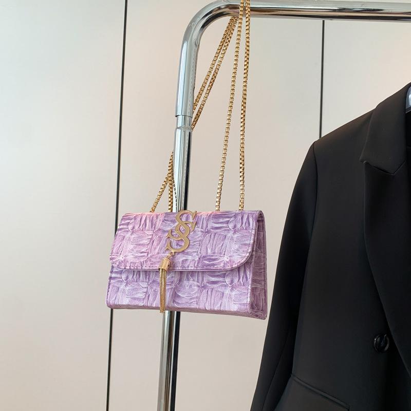 

Niche texture chain underarm bag 2025 summer new versatile ins messenger bag temperament simple small square bag women фіолетовий