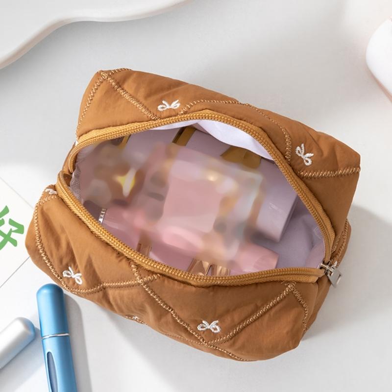 Large Capacity Makeup Organizers with Quilted Bowknot Accent and Multiple Divisions for Efficient Travel