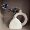 Elegante vaso rotondo geometrico a forma di foglia, vaso minimalista in plastica, vaso per fiori in plastica
