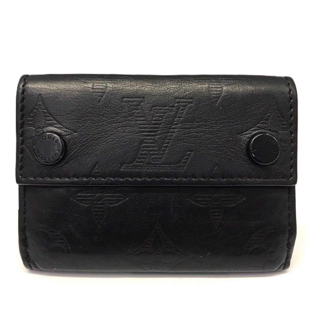 

Used LOUIS VUITTONTri-fold wallet leather Women