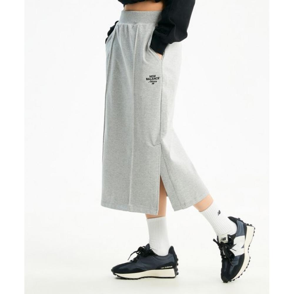 

NEW BALANCE NBNWE1W222 ЖЕНСКАЯ НОВАЯ ДЛИННАЯ ЮБКА ESSENTIAL MELINGE СЕРАЯ