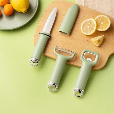 Multi-Function Kitchen Tool Set: Peeler, Fruit Knife, and Bottle Opener.