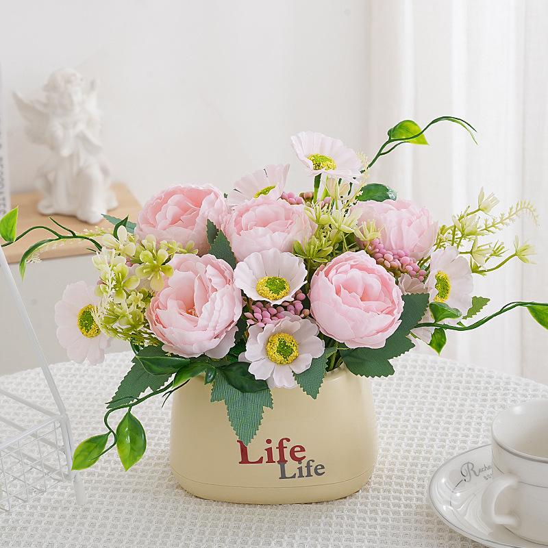 Living Room Decor: Artificial Sunflower and Green Plant Arrangements, Small Potted Plants, and Plastic Bouquets