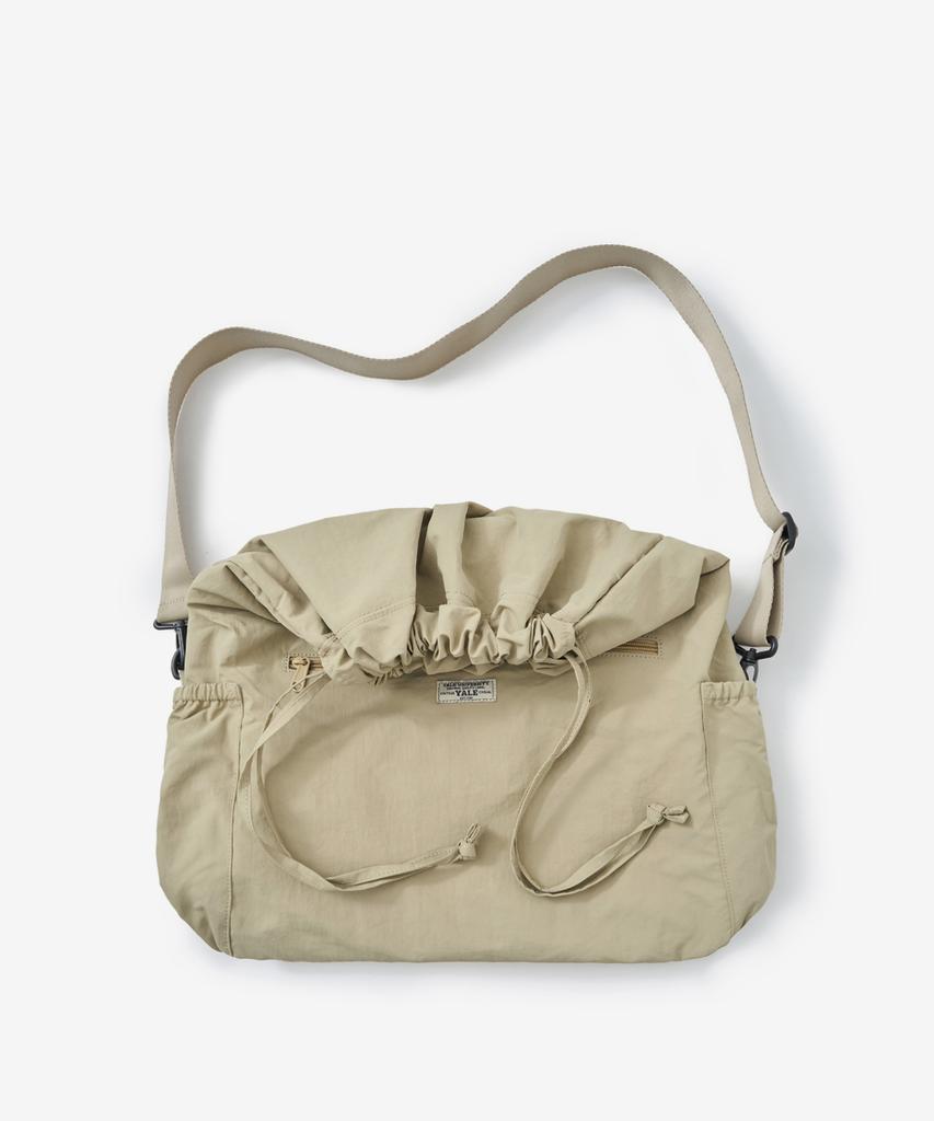 Yale Drawstring Crossbody Bag_Beige