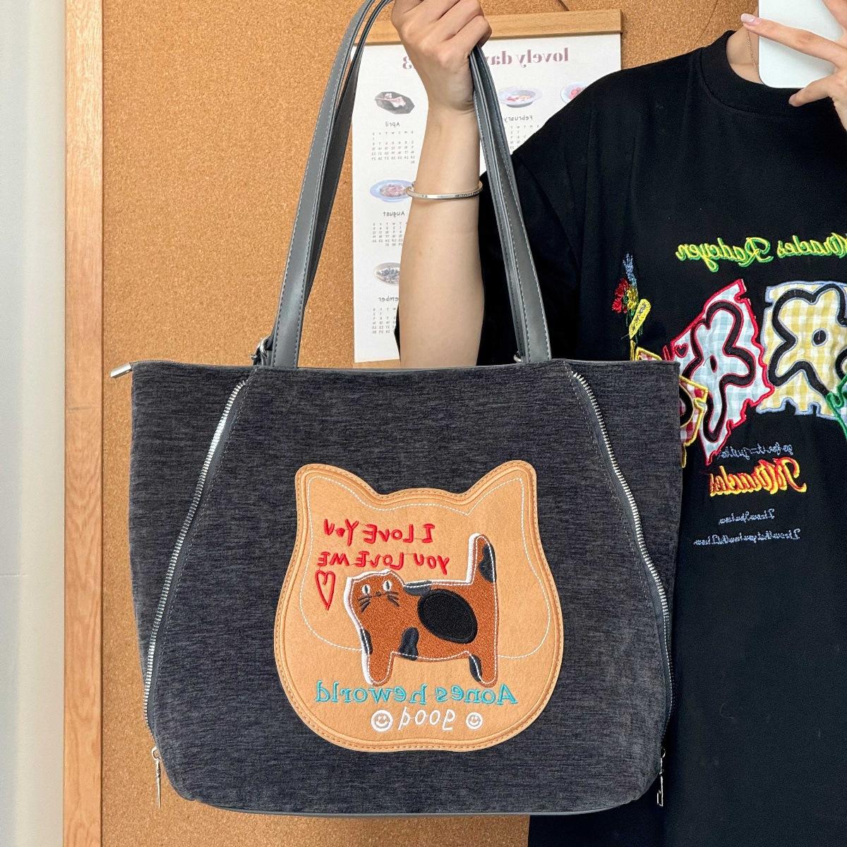 

Cute biscuit cat embroidered backpack women s autumn and winter retro large capacity shoulder tote bag commuter messenger bag сірий колір