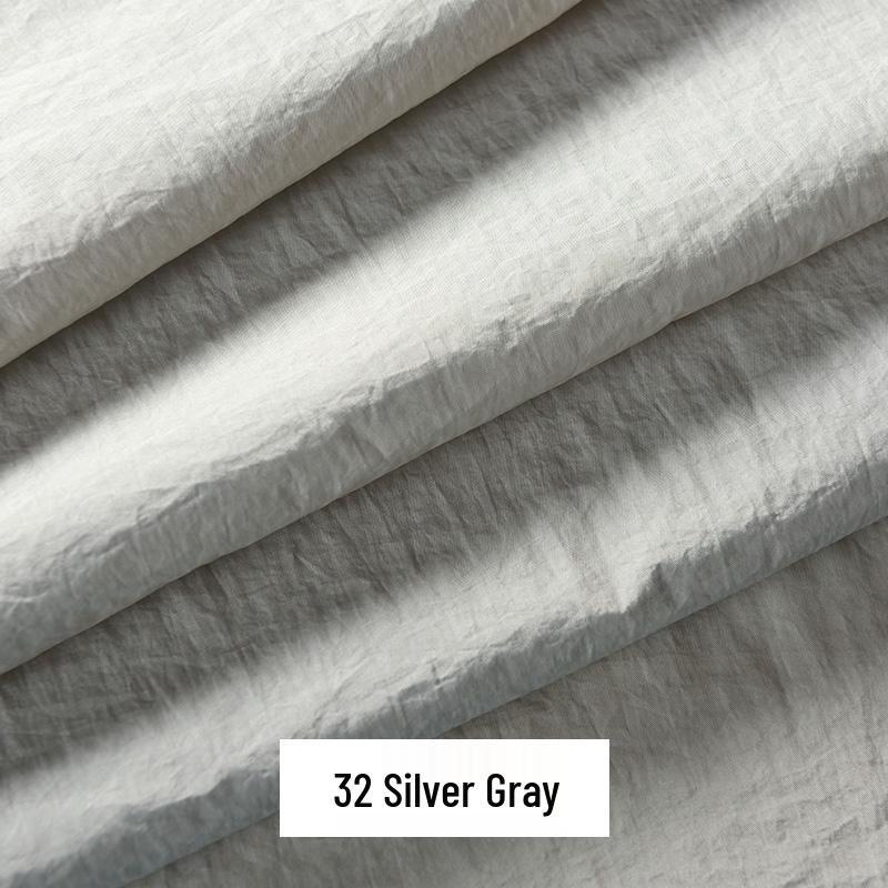 

70D Nylon Micro-Wrinkle Waterproof Down Jacket Fabric with Nyspun Cotton серебряный серый