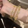 Handmade Delicate Lace Pull-Through Bracelet With Four-Leaf Clover Design Gold White Pearl Stackable Elegant Womens Jewelry