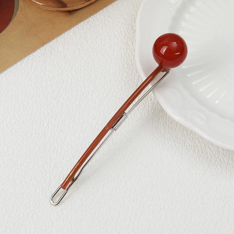 2024 Trend: Round Ball Acrylic Lollipop Hair Clip – Simple, Celebrity-Style Accessory
