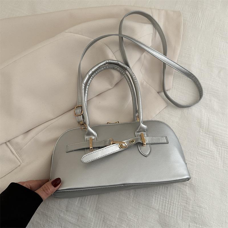 

Simple niche portable commuter bag women s new fashionable retro underarm bag simple large-capacity messenger bag срібний