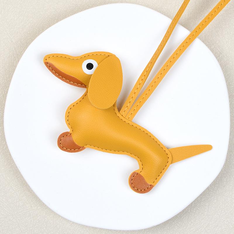 Breloc Piele Teckel Pui & Șnur Telefon