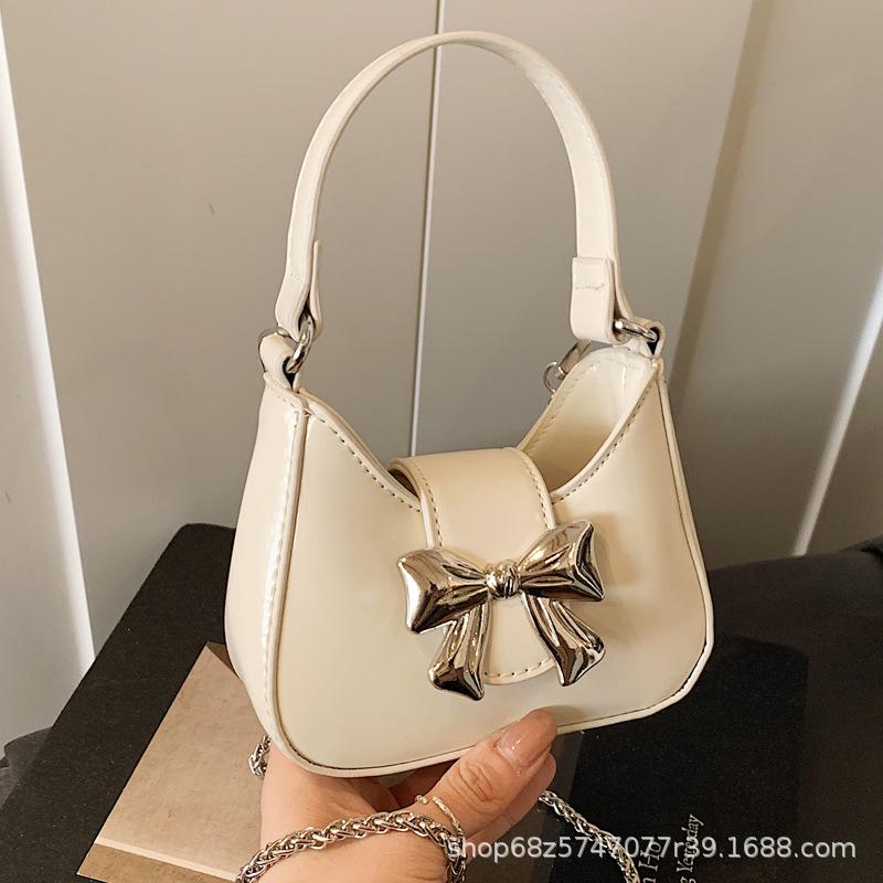 Foreign style mini small bag women 2025 new Korean version versatile bow portable shoulder crossbody small bag mouth red envelope