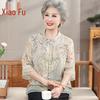 Elegante chinesische Bluse mit Sieben-Punkt-Ärmeln