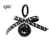Halloween Backpacks Charm Pumpkin Bell Keychain, Hollow Head Key Ring with Ribbon Bow, for Holiday Party Decoration Keychain