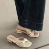 Elegant fashion square head thin heel cool slippers women's 2025 spring and summer word with bow temperament versatile cool half drag tide