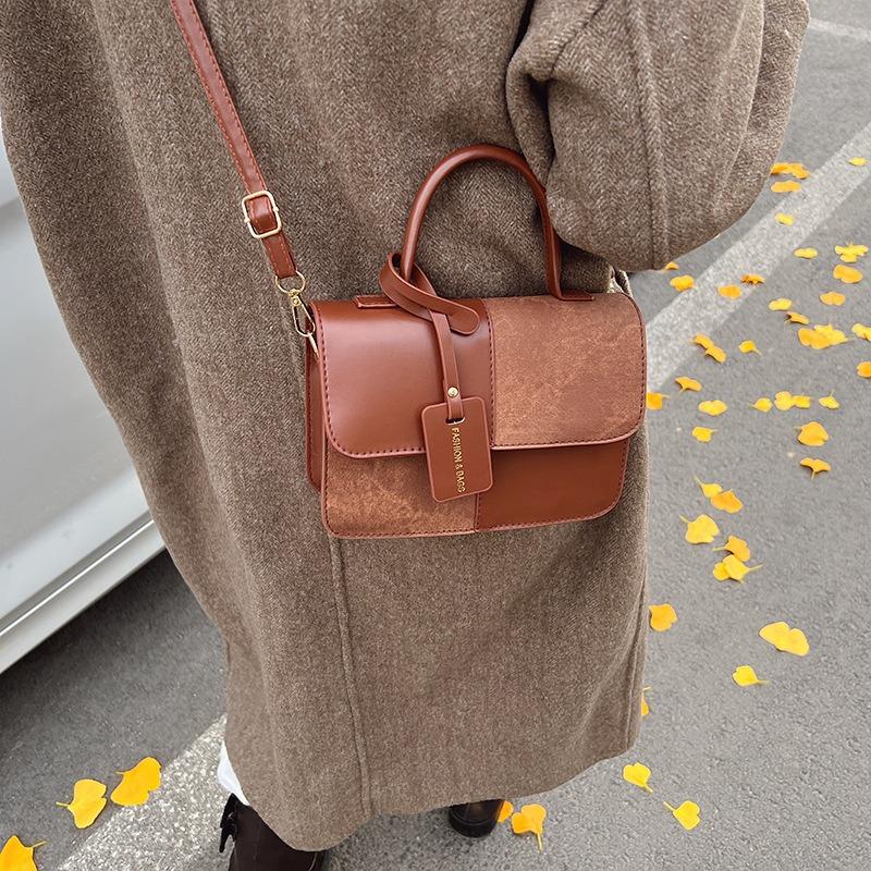 Winter new niche design contrasting color splicing portable small square bag fashionable simple retro shoulder bag