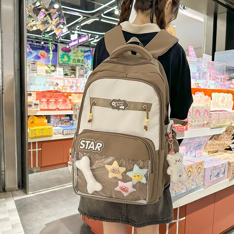 Small fresh contrasting color schoolbag niche design casual versatile children's backpack high value light burden reduction shoulder