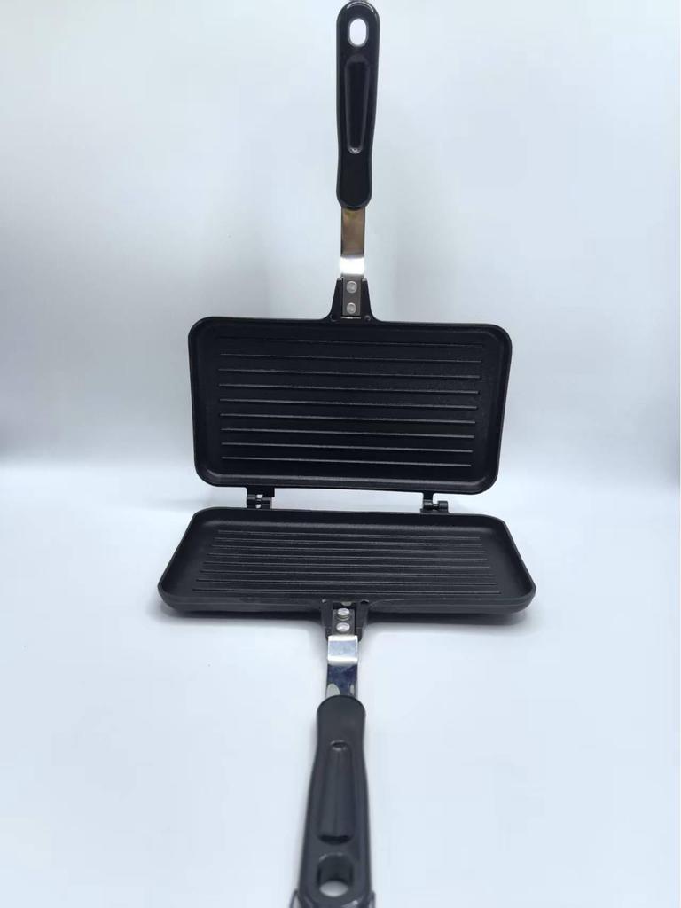 Introducing the "Double-Sided Striped Grill Pan" – perfect for sandwiches, steaks, and eggs.