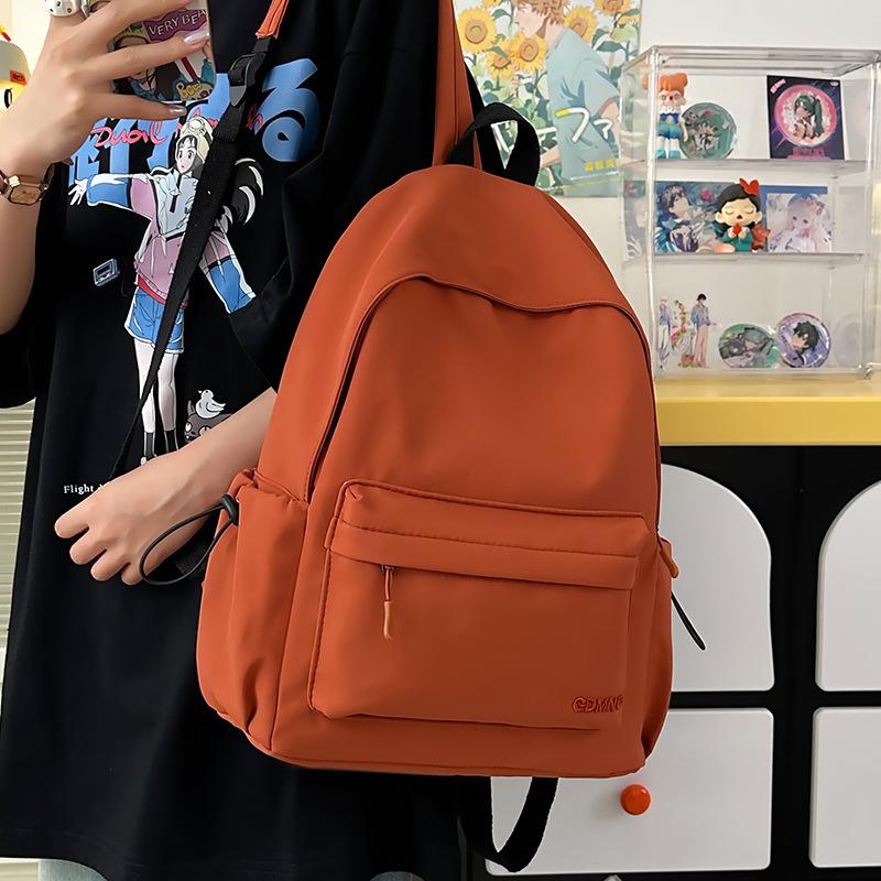 Korean high-value backpack for junior high school students, casual, simple, fashionable and versatile, large capacity